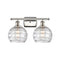 Deco Swirl Bath Vanity Light shown in the Polished Nickel finish with a Clear shade