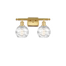 Deco Swirl Bath Vanity Light shown in the Satin Gold finish with a Clear shade