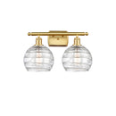 Deco Swirl Bath Vanity Light shown in the Satin Gold finish with a Clear shade