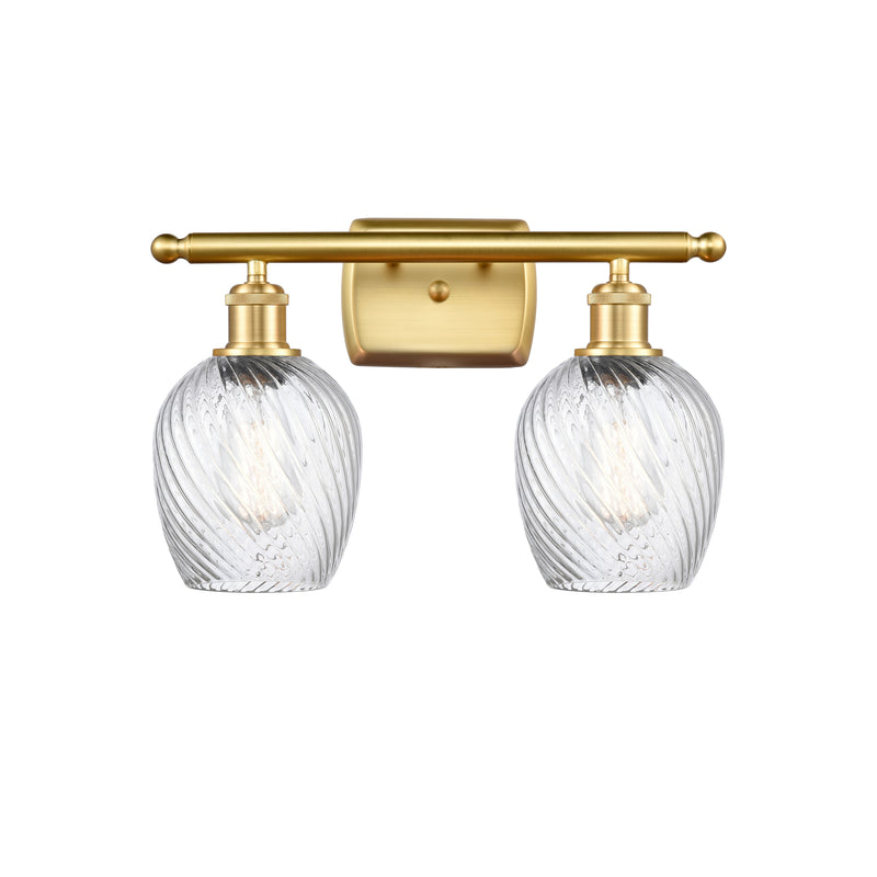 Salina Bath Vanity Light shown in the Satin Gold finish with a Clear Spiral Fluted shade
