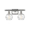 Deco Swirl Bath Vanity Light shown in the Brushed Satin Nickel finish with a Clear shade