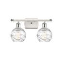 Deco Swirl Bath Vanity Light shown in the White and Polished Chrome finish with a Clear shade