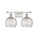 Deco Swirl Bath Vanity Light shown in the White and Polished Chrome finish with a Clear shade