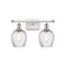 Salina Bath Vanity Light shown in the White and Polished Chrome finish with a Clear Spiral Fluted shade