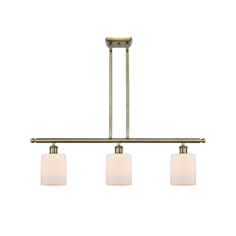 Cobbleskill Island Light shown in the Antique Brass finish with a Matte White shade