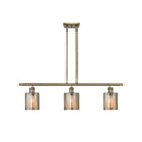 Cobbleskill Island Light shown in the Antique Brass finish with a Mercury shade