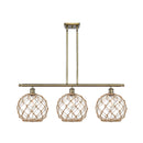 Farmhouse Rope Island Light shown in the Antique Brass finish with a Clear Glass with Brown Rope shade