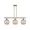 Farmhouse Rope Island Light shown in the Antique Brass finish with a Clear Glass with Brown Rope shade