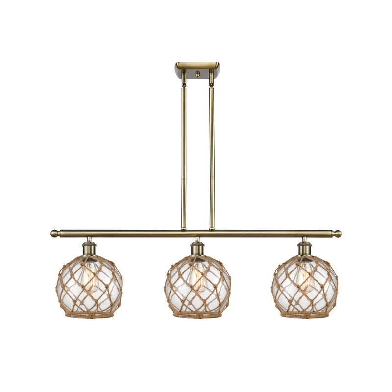 Farmhouse Rope Island Light shown in the Antique Brass finish with a Clear Glass with Brown Rope shade