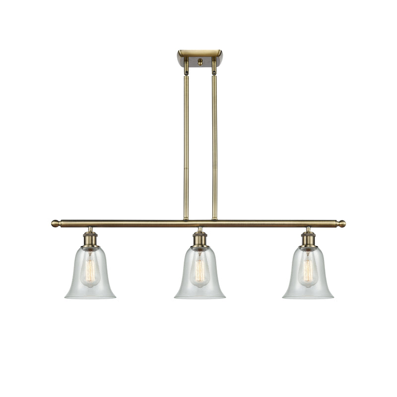 Hanover Island Light shown in the Antique Brass finish with a Fishnet shade