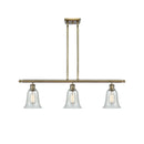 Hanover Island Light shown in the Antique Brass finish with a Fishnet shade