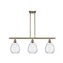 Waverly Island Light shown in the Antique Brass finish with a Clear shade