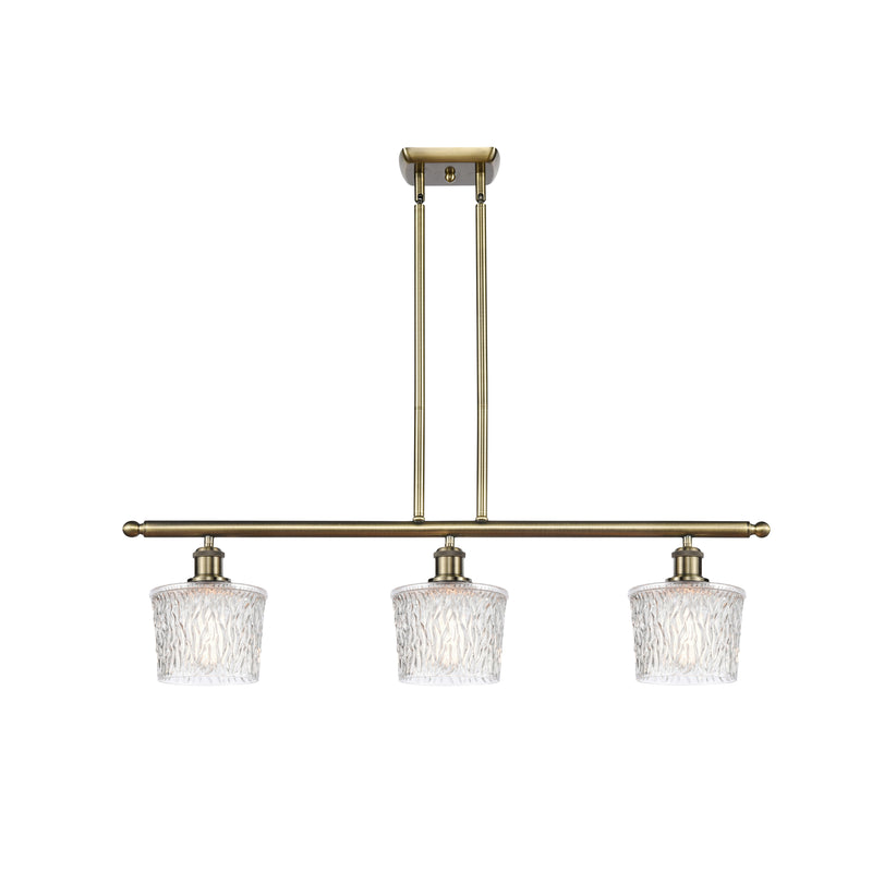 Niagra Island Light shown in the Antique Brass finish with a Clear shade