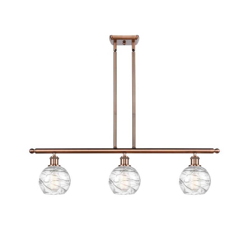 Deco Swirl Island Light shown in the Antique Copper finish with a Clear shade