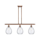 Waverly Island Light shown in the Antique Copper finish with a Clear shade