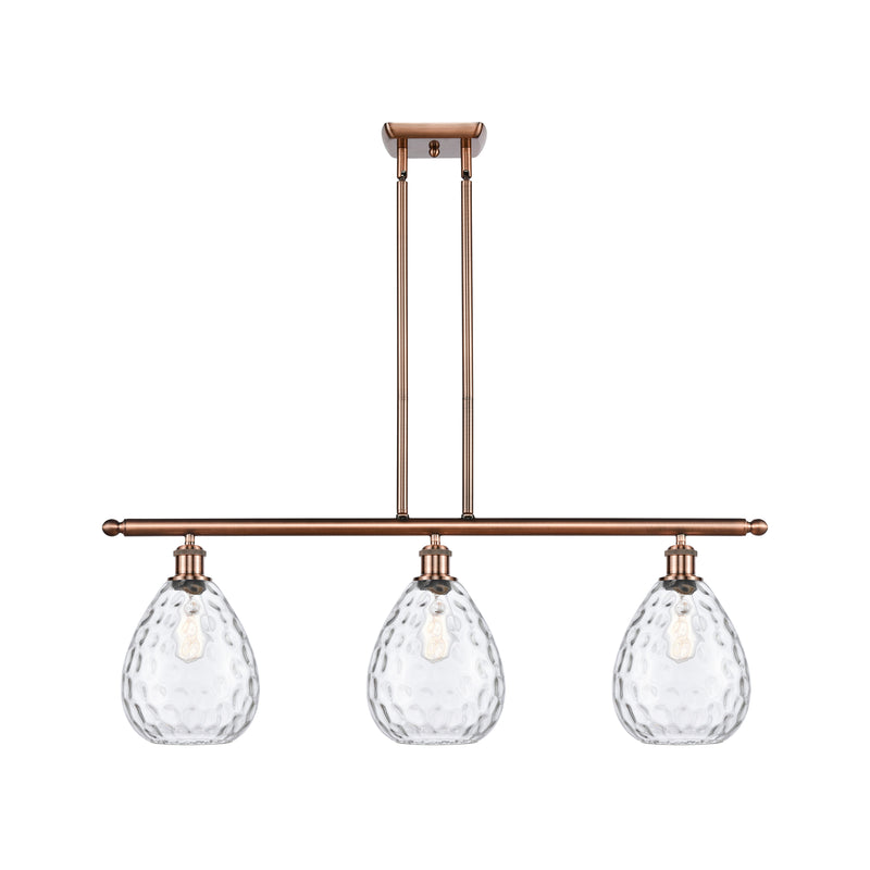 Waverly Island Light shown in the Antique Copper finish with a Clear shade