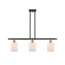 Cobbleskill Island Light shown in the Black Antique Brass finish with a Matte White shade