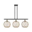 Farmhouse Rope Island Light shown in the Black Antique Brass finish with a Clear Glass with Brown Rope shade