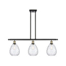 Waverly Island Light shown in the Black Antique Brass finish with a Clear shade