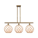 Farmhouse Rope Island Light shown in the Brushed Brass finish with a White Glass with Brown Rope shade