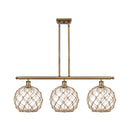 Farmhouse Rope Island Light shown in the Brushed Brass finish with a Clear Glass with Brown Rope shade