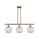 Farmhouse Rope Island Light shown in the Brushed Brass finish with a Clear Glass with White Rope shade
