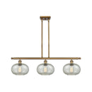 Gorham Island Light shown in the Brushed Brass finish with a Mica shade