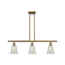 Hanover Island Light shown in the Brushed Brass finish with a Mouchette shade