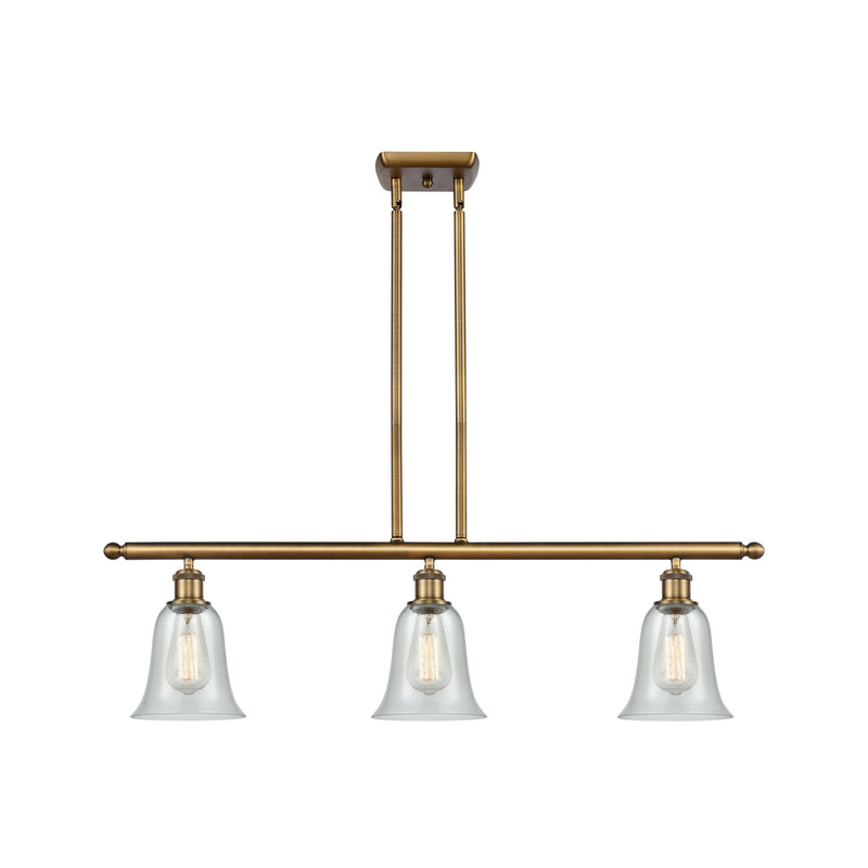 Hanover Island Light shown in the Brushed Brass finish with a Fishnet shade