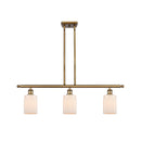 Hadley Island Light shown in the Brushed Brass finish with a Matte White shade