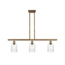 Hadley Island Light shown in the Brushed Brass finish with a Clear shade