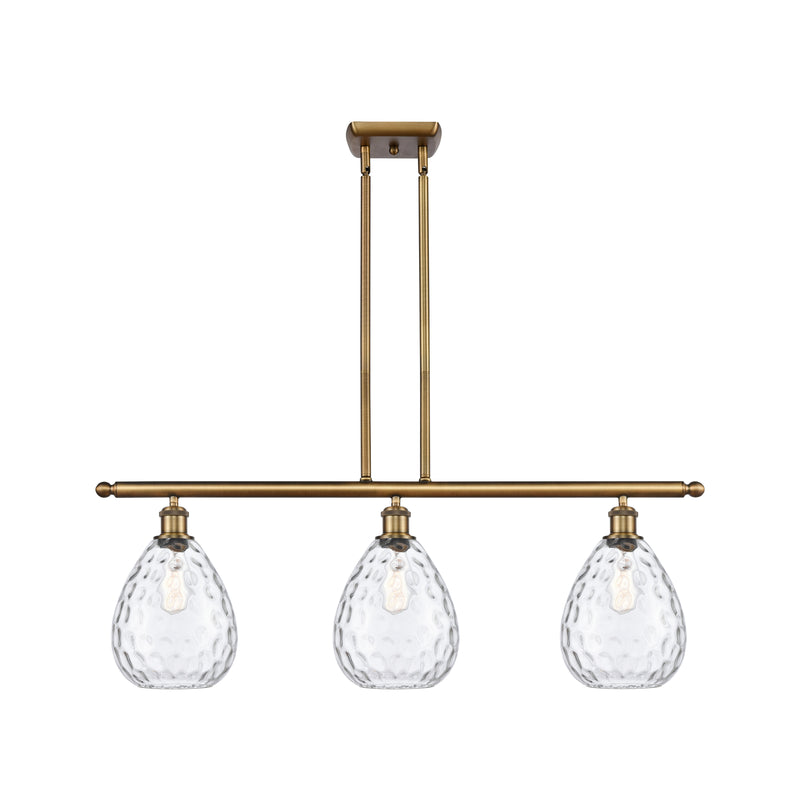 Waverly Island Light shown in the Brushed Brass finish with a Clear shade