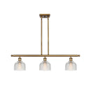 Dayton Island Light shown in the Brushed Brass finish with a Clear shade