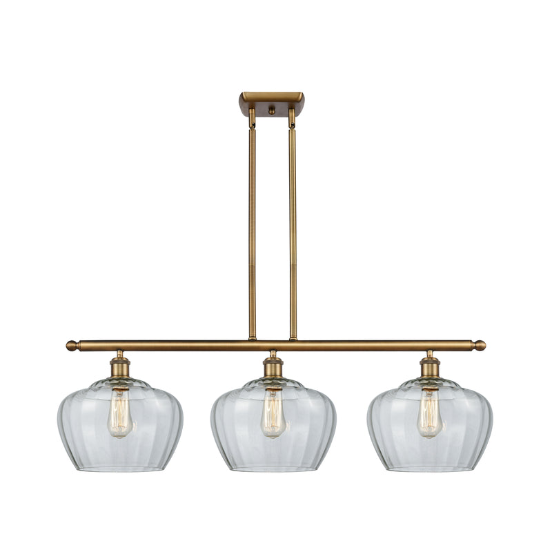 Fenton Island Light shown in the Brushed Brass finish with a Clear shade