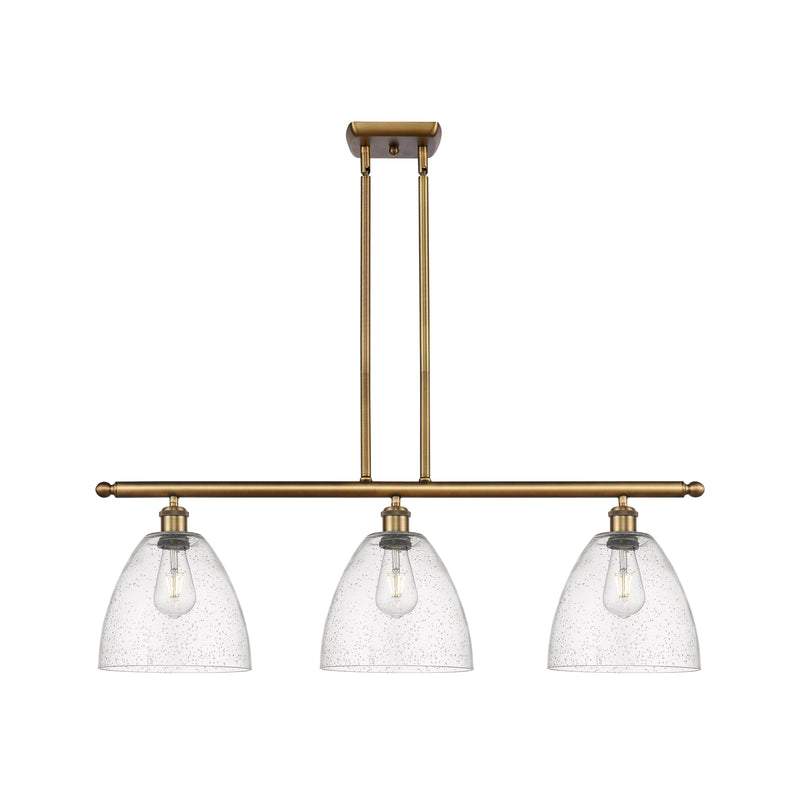 Ballston Dome Island Light shown in the Brushed Brass finish with a Seedy shade