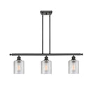 Cobbleskill Island Light shown in the Matte Black finish with a Clear shade