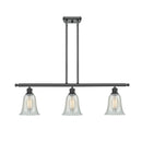 Hanover Island Light shown in the Matte Black finish with a Mouchette shade