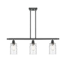 Candor Island Light shown in the Matte Black finish with a Clear Waterglass shade