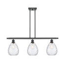 Waverly Island Light shown in the Matte Black finish with a Clear shade