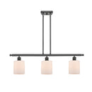 Cobbleskill Island Light shown in the Oil Rubbed Bronze finish with a Matte White shade