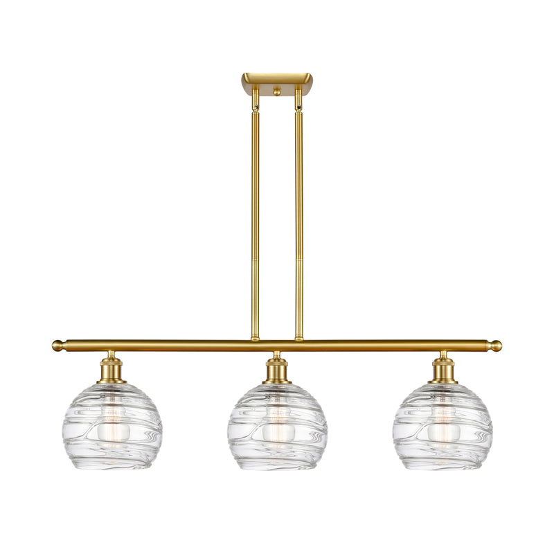 Deco Swirl Island Light shown in the Satin Gold finish with a Clear shade