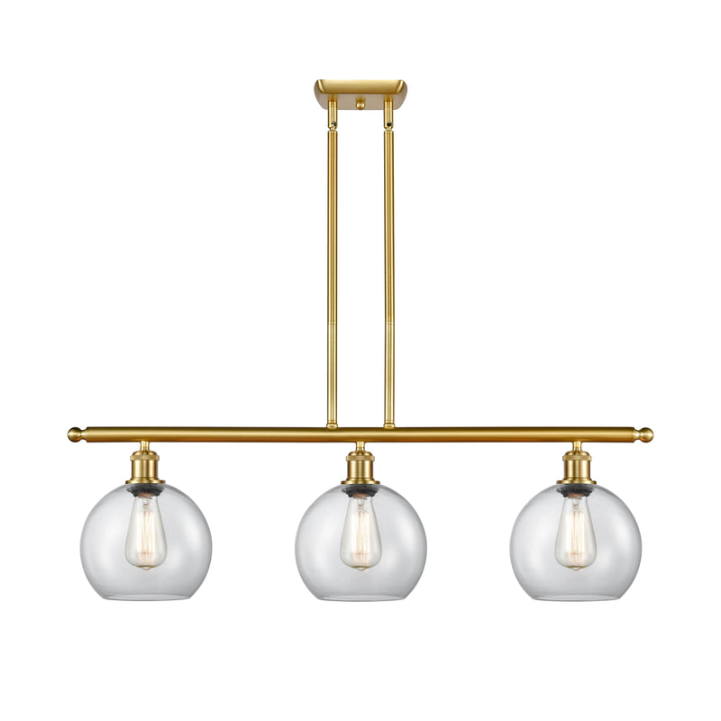 Athens Island Light shown in the Satin Gold finish with a Clear shade