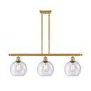 Athens Island Light shown in the Satin Gold finish with a Seedy shade