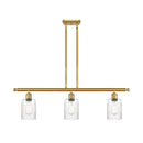 Hadley Island Light shown in the Satin Gold finish with a Clear shade