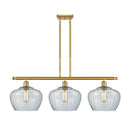 Fenton Island Light shown in the Satin Gold finish with a Clear shade