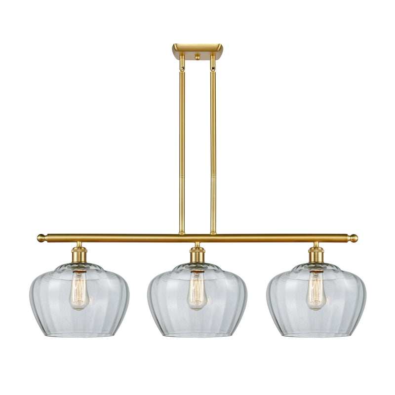 Fenton Island Light shown in the Satin Gold finish with a Clear shade