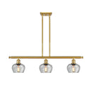 Fenton Island Light shown in the Satin Gold finish with a Clear shade