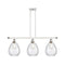 Waverly Island Light shown in the White and Polished Chrome finish with a Clear shade