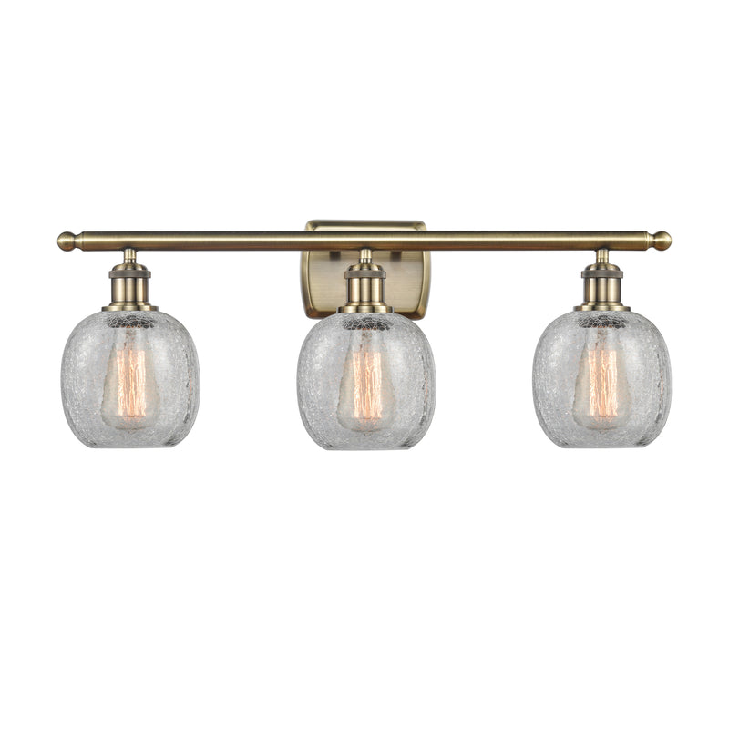 Belfast Bath Vanity Light shown in the Antique Brass finish with a Clear Crackle shade