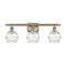 Deco Swirl Bath Vanity Light shown in the Antique Brass finish with a Clear shade